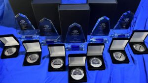 Trophies and medals from the 2023 Intranet & Digital Workplace Awards.